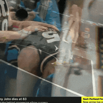 Blurred Person With Number 53 On Shirt GIF