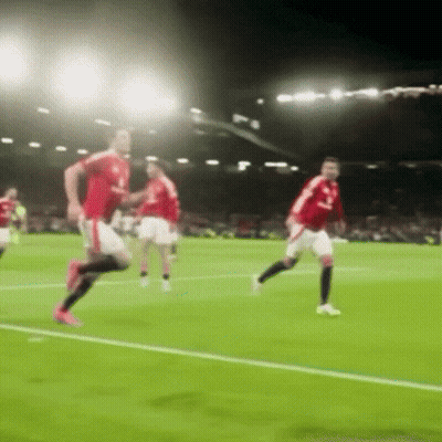 Blurred Soccer Players With United Jersey GIF