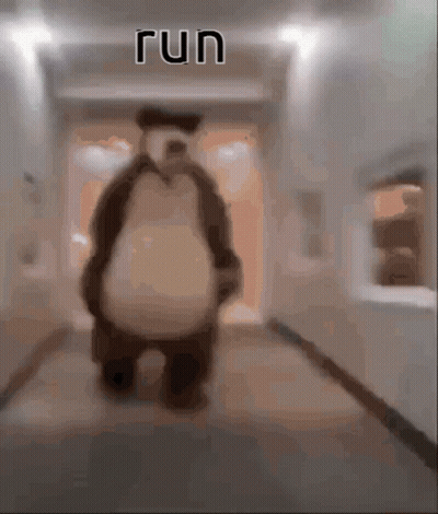 Blurred Teddy Bear In Hallway Saying Run GIF