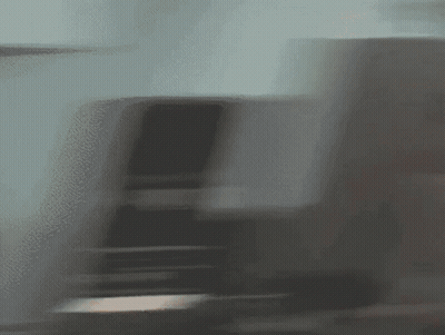 Blurred Train Going Down Staircase GIF