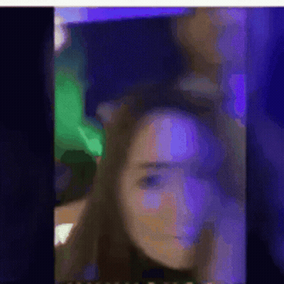 Blurred Woman Face With Purple And Green Lights GIF