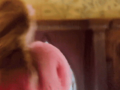 Blurred Woman's Butt With Pink Pillow GIF