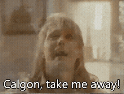 Blurred Woman Saying Calgon Take Me Away GIF