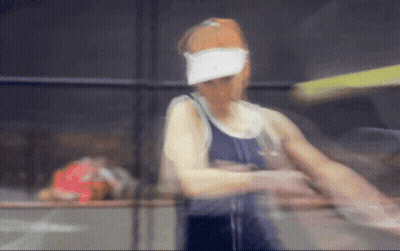 Blurred Woman Wearing White Visor GIF