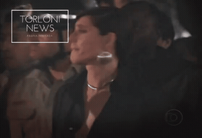 Blurred Woman With Torloni News GIF
