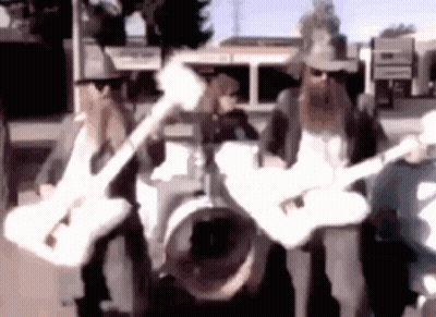 Blurry Band Playing Guitars GIF