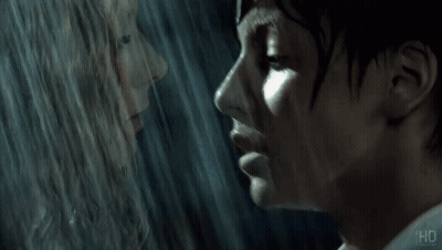 Blurry Boy And Girl With HD Letters GIF