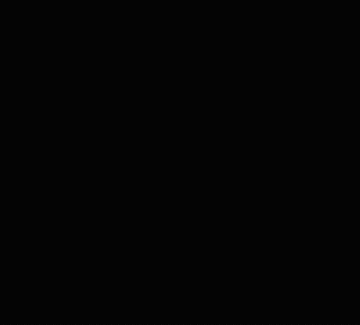 Blurry Boy In Blue Shirt Laying On Ground GIF