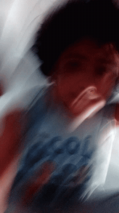 Blurry Boy Wearing Cool Shirt GIF