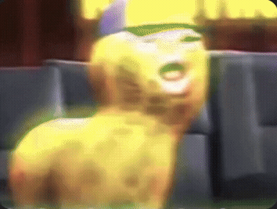 Blurry Cartoon Character Sitting In Theater GIF