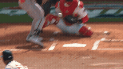 Blurry Catcher Sliding Home Plate GIF