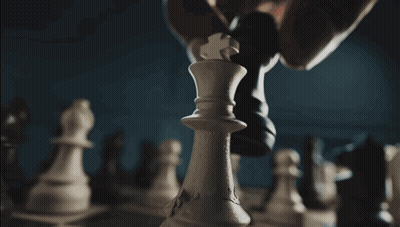 Blurry Chess Board With Moving Pieces GIF