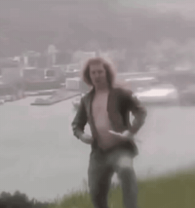 Blurry Couple Walking In Fog GIF