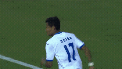 Blurry Crowd With Yellow Mexico Shirt GIF