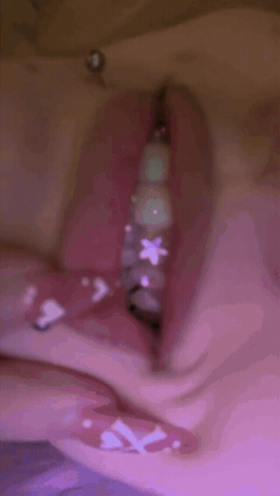 Blurry Face With Purple Light Behind GIF
