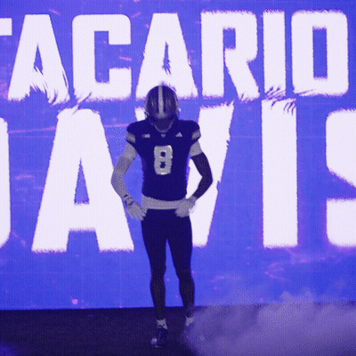 Blurry Football Player In Blue Jersey Number 15 GIF