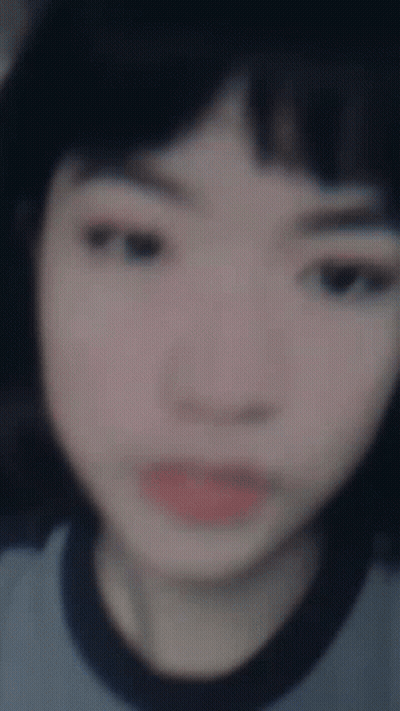 Blurry Girl In Blue Shirt GIF