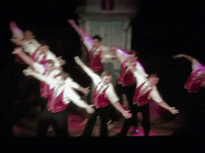 Blurry Group Dancing In Dark Room GIF