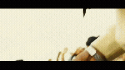 Blurry Group Of People Sitting On Beach GIF