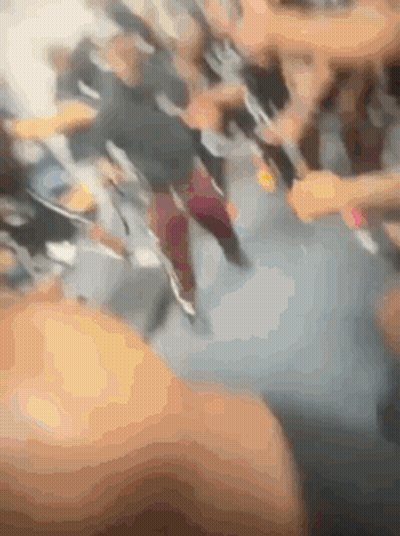 Blurry Group Of People Walking Down Street GIF