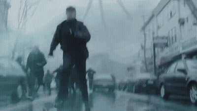 Blurry Group Walking Down Street GIF