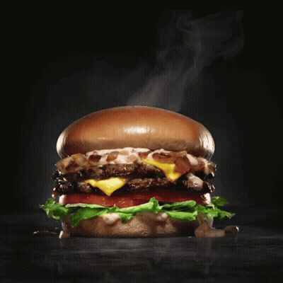 Blurry Hamburger With Cheese Lettuce Tomato And Onions GIF