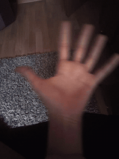 Blurry Hand On Carpet GIF