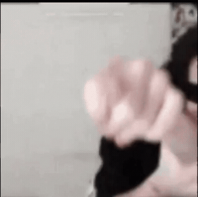 Blurry Hand With Black Glove GIF