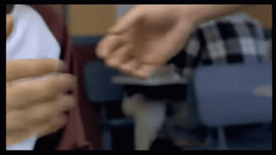 Blurry Hands With Person In Background GIF