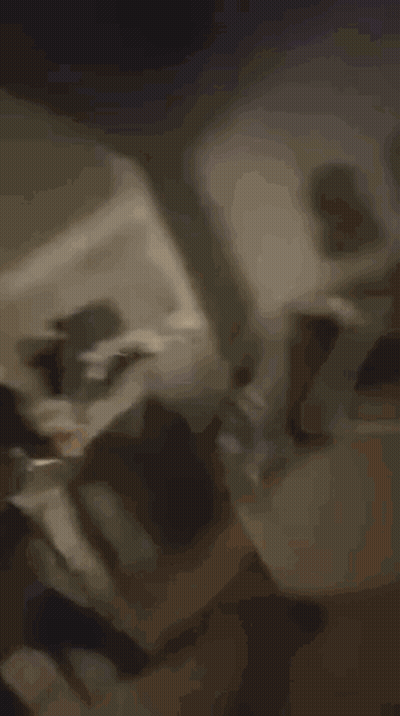 Blurry Living Room With Stairs And Table GIF