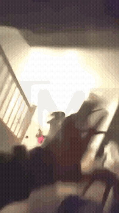 Blurry Living Room With Stairs And Table GIF