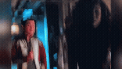 Blurry Man And Woman Standing Together GIF