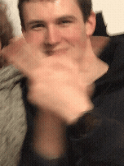Blurry Man Covering Mouth GIF