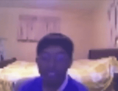 Blurry Man Face in Bedroom