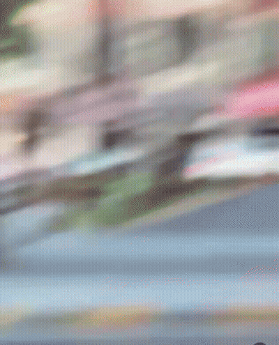 Blurry Man Face With Red Light Background GIF
