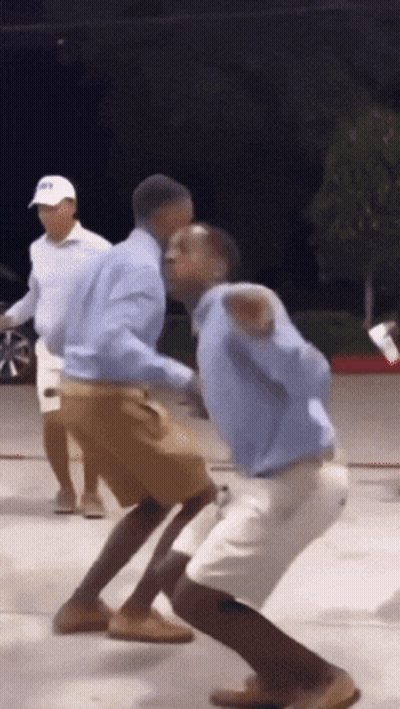 Blurry Man Holding Gun In Room GIF