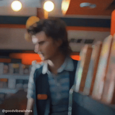 Blurry Man Holding Sandwiches In Restaurant GIF
