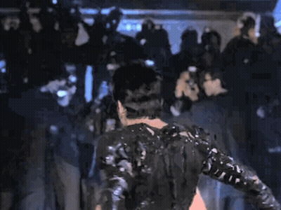 Blurry Man In Black Jacket GIF
