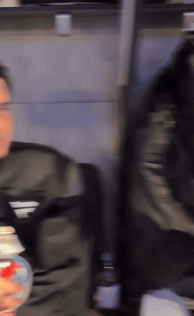 Blurry Man In Black Jacket With Letter F GIF