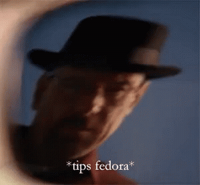 Blurry Man In Fedora Saying Tips Fedora GIF