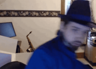 Blurry Man In Fedora Saying Tips Fedora GIF