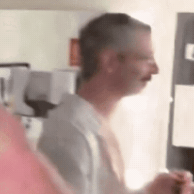 Blurry Man In Kitchen With Microwave GIF