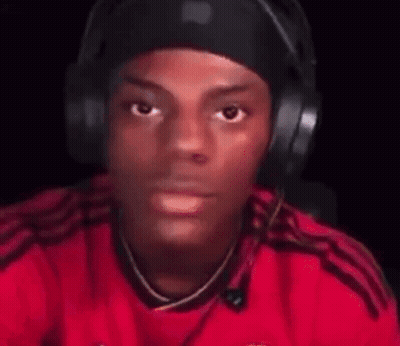 Blurry Man In Red Shirt With Headphones GIF