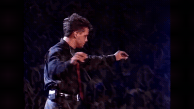 Blurry Man In Suit And Red Tie GIF