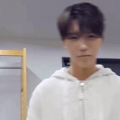 Blurry Man In White Hoodie GIF