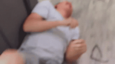 Blurry Man Laying On Floor GIF