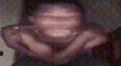 Blurry Man Making Face With Hands GIF