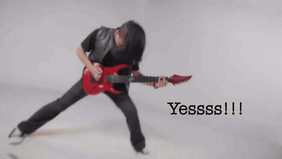 Blurry Man Playing Red Electric Guitar Saying Yesss GIF