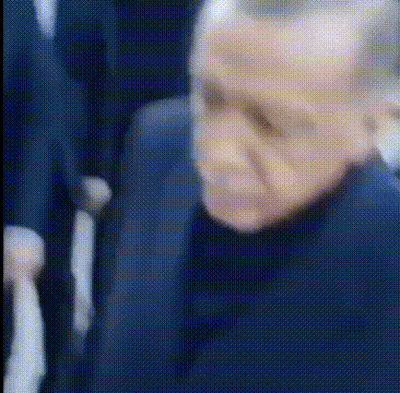 Blurry Man's Face In Dark Room GIF
