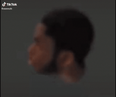 Blurry Man's Face With Tik Tok Watermark GIF
